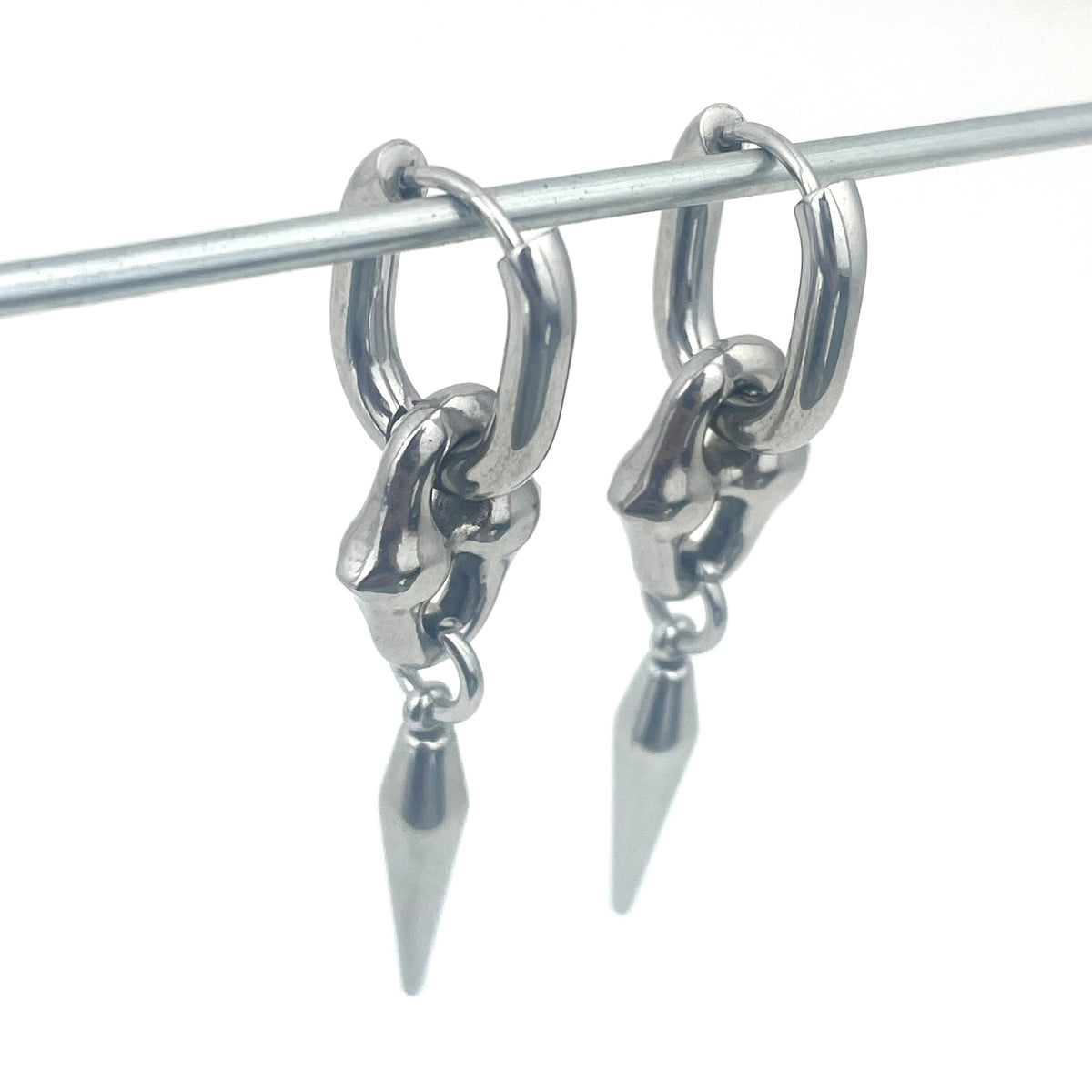 Titanium-Steel Waterproof Pointed Cone Pendant Earrings