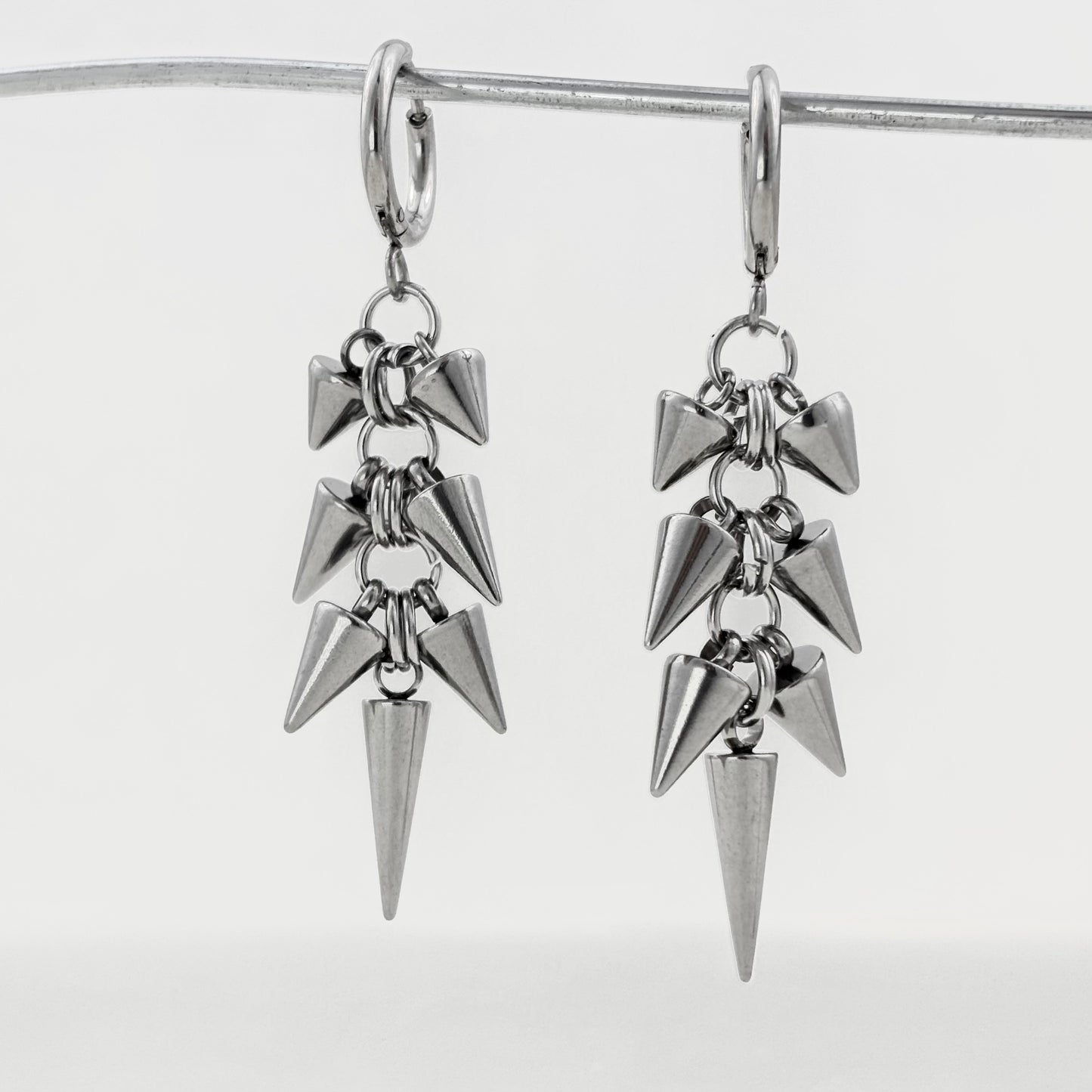 Titanium steel rivets conical bullet earrings