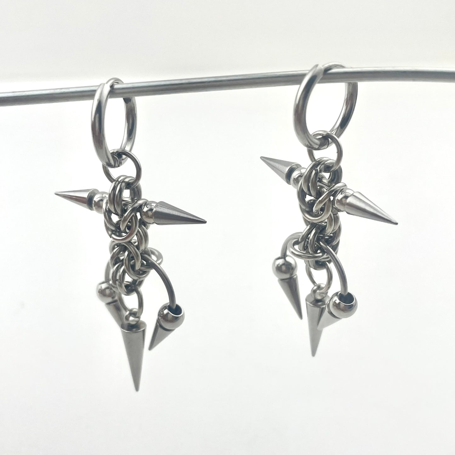 Titanium Waterproof Earrings, Thorn-and-Horseshoe Pendant