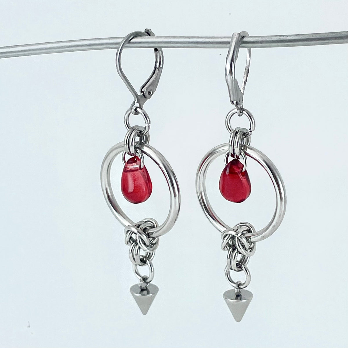 Titanium-Steel Waterproof Red Teardrop Rivet Earrings