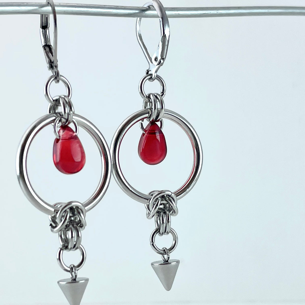 Titanium-Steel Waterproof Red Teardrop Rivet Earrings