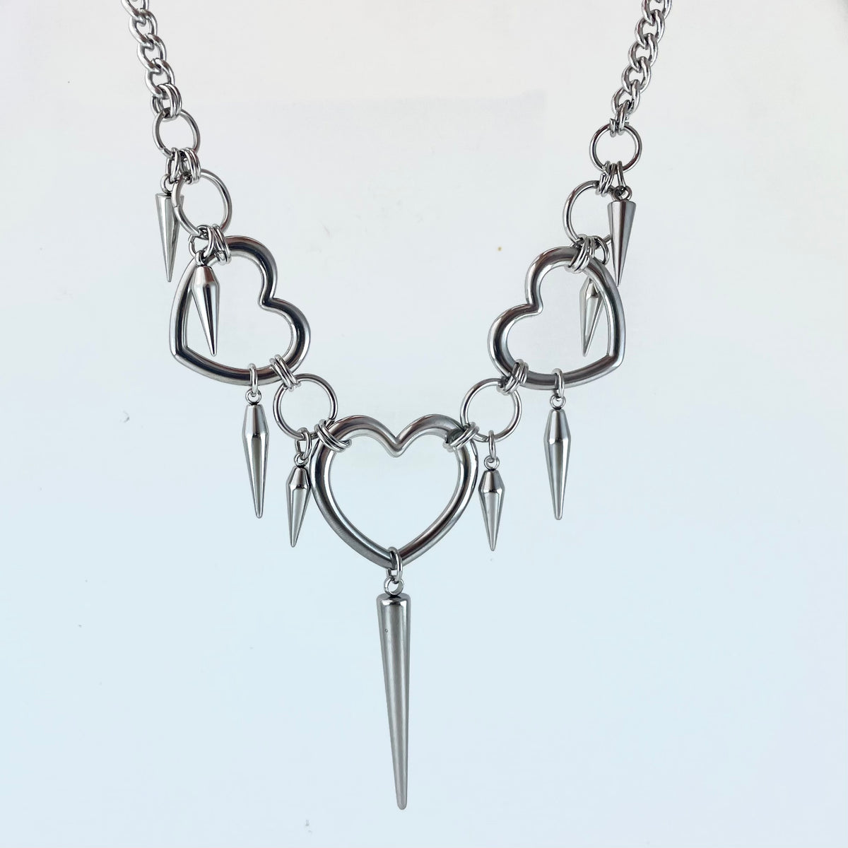Titanium-Steel Waterproof Heart-Shaped Rivet Necklace