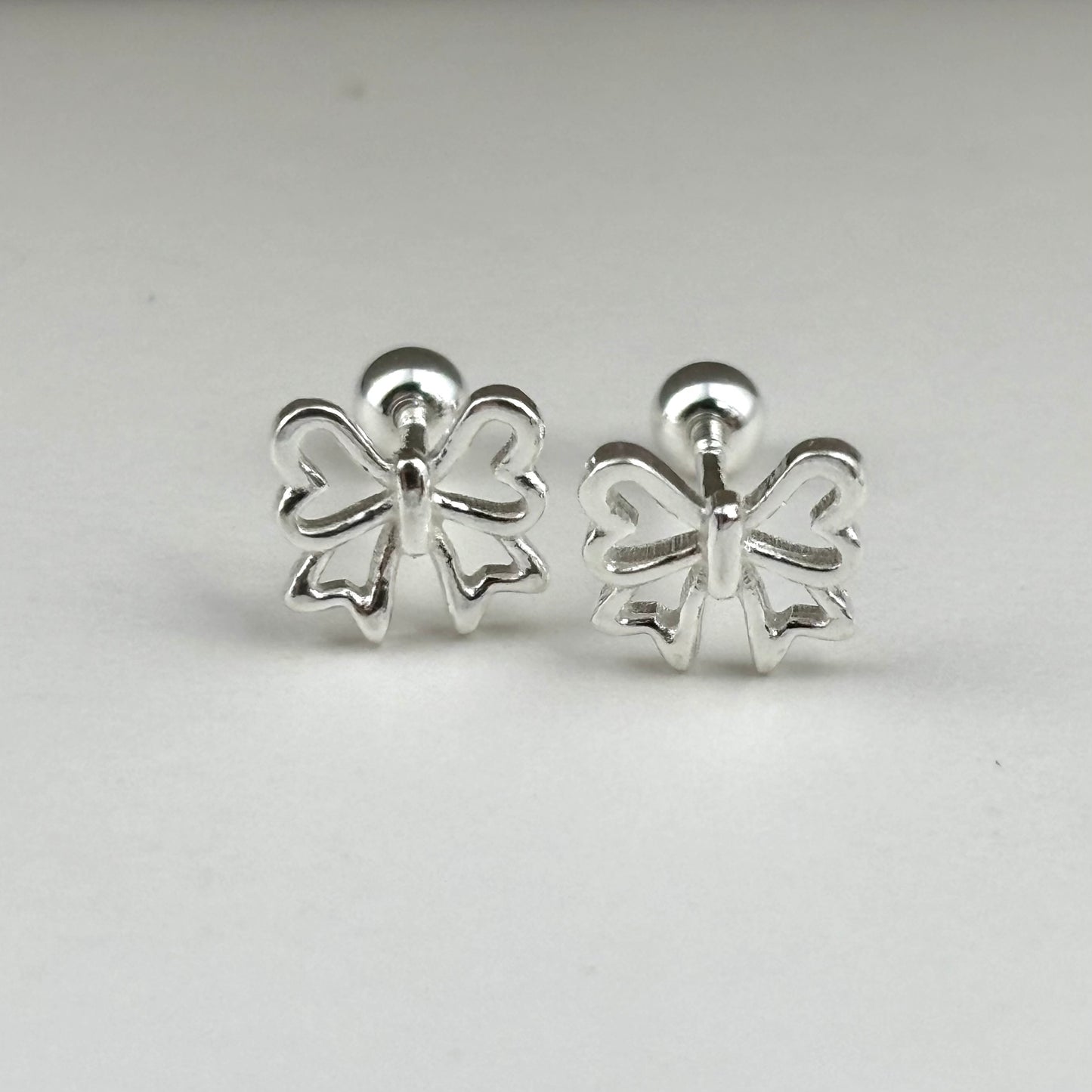 S999 Sterling Silver Bow Earrings