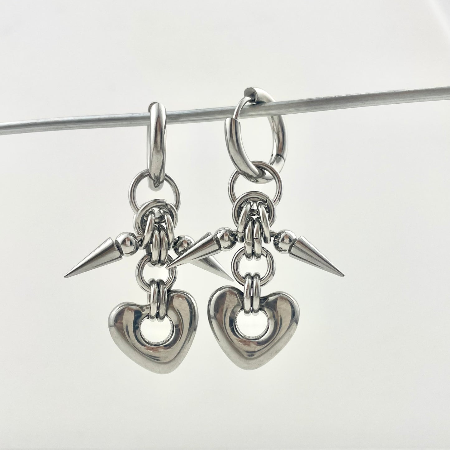 Titanium Waterproof Earrings with Heart-Shaped Stud Pendant