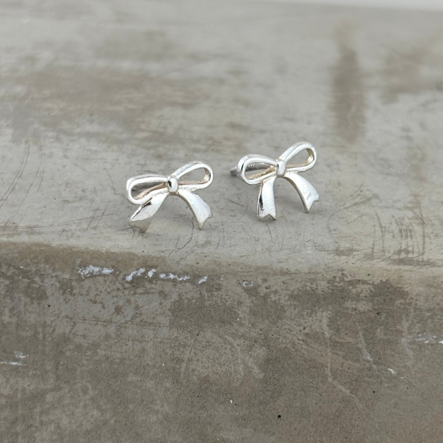 S999 Sterling Silver Bow Earrings