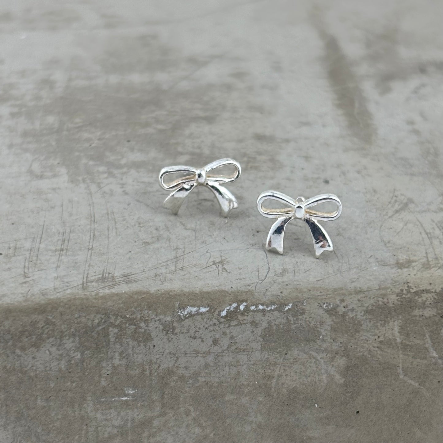 S999 Sterling Silver Bow Earrings