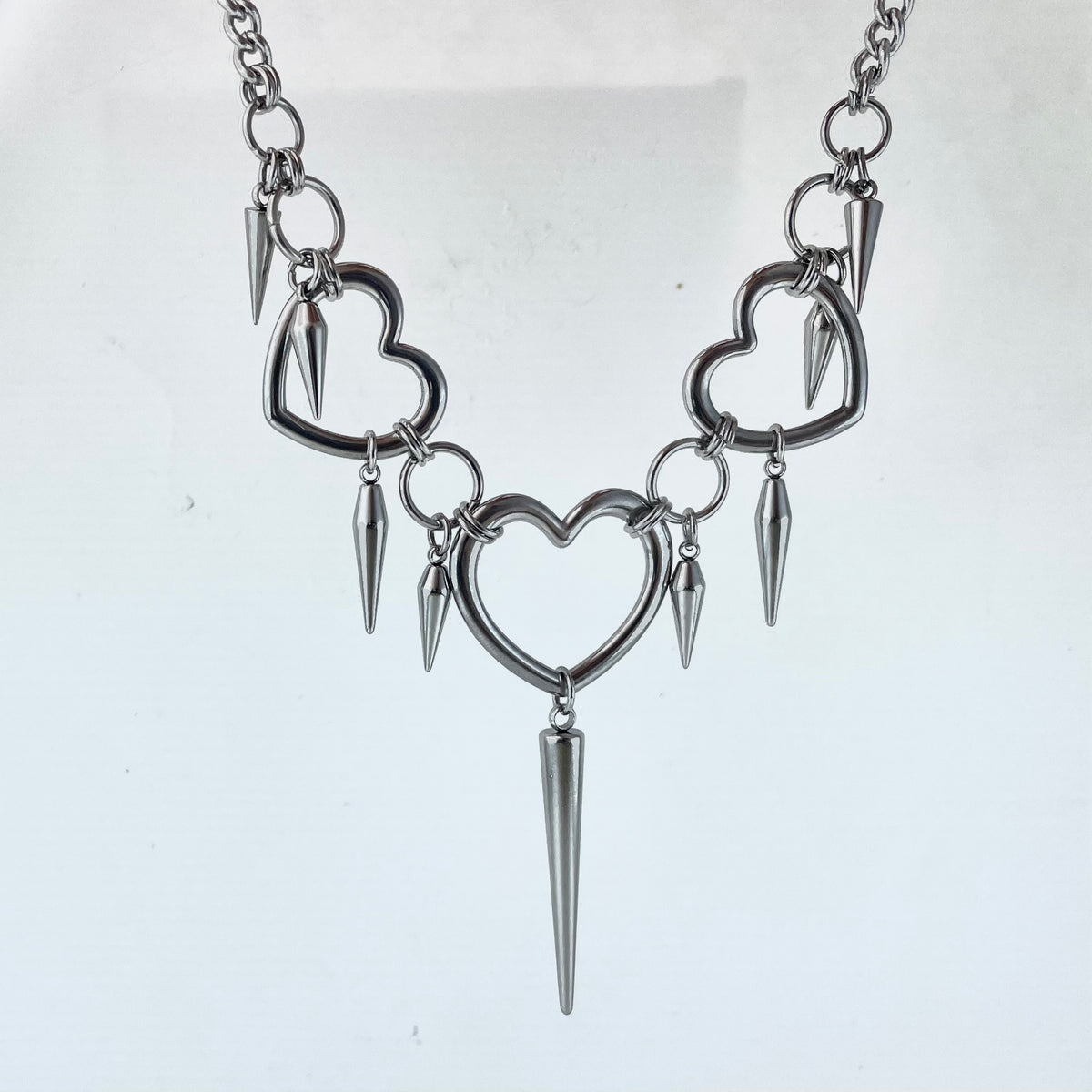 Titanium-Steel Waterproof Heart-Shaped Rivet Necklace