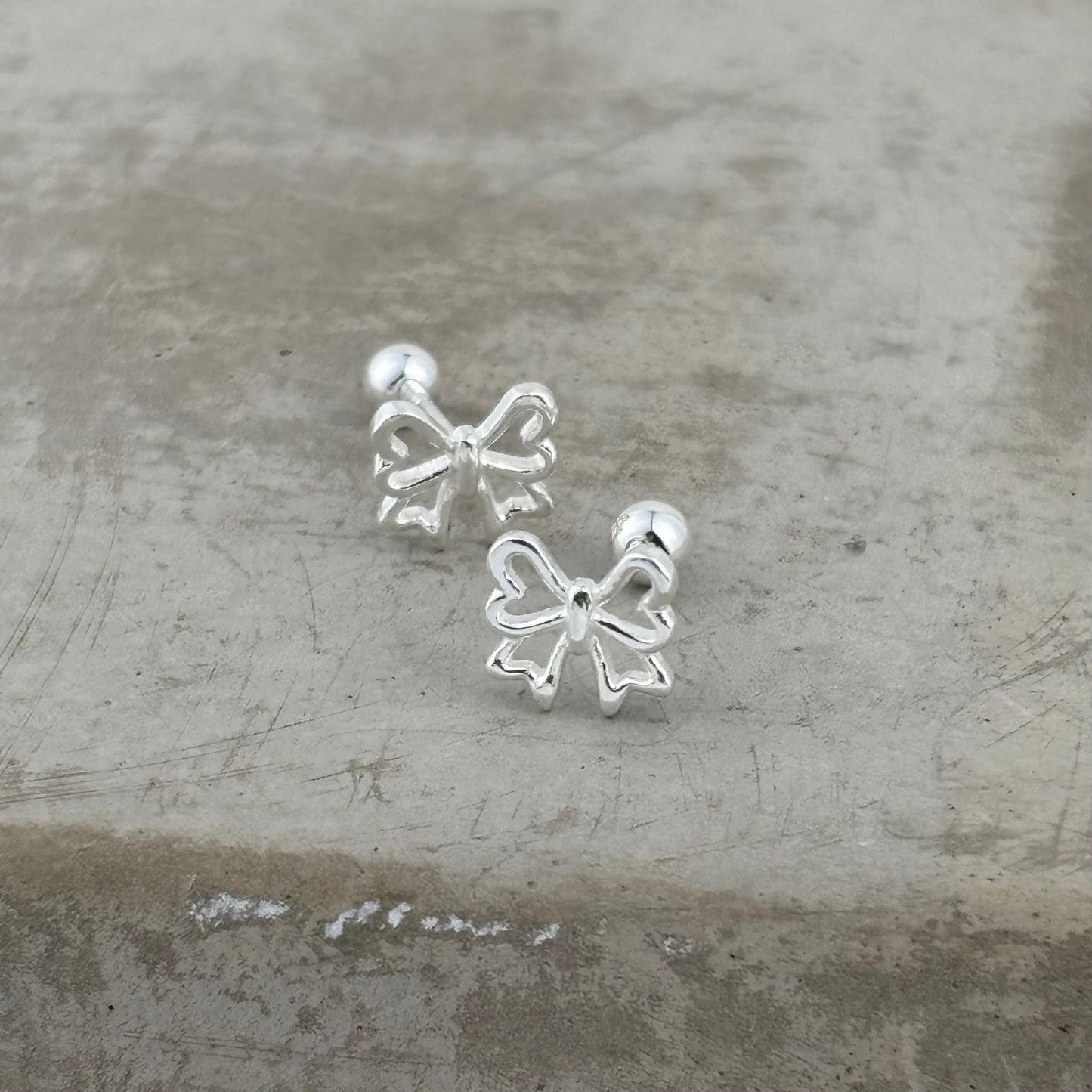 S999 Sterling Silver Bow Earrings