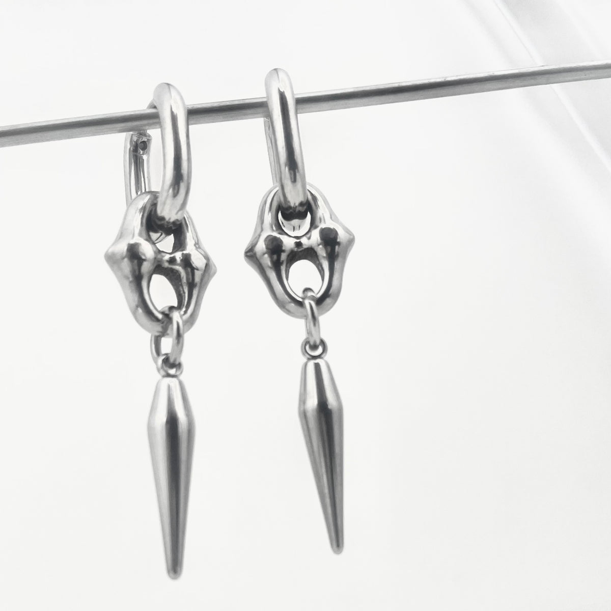 Titanium-Steel Waterproof Pointed Cone Pendant Earrings