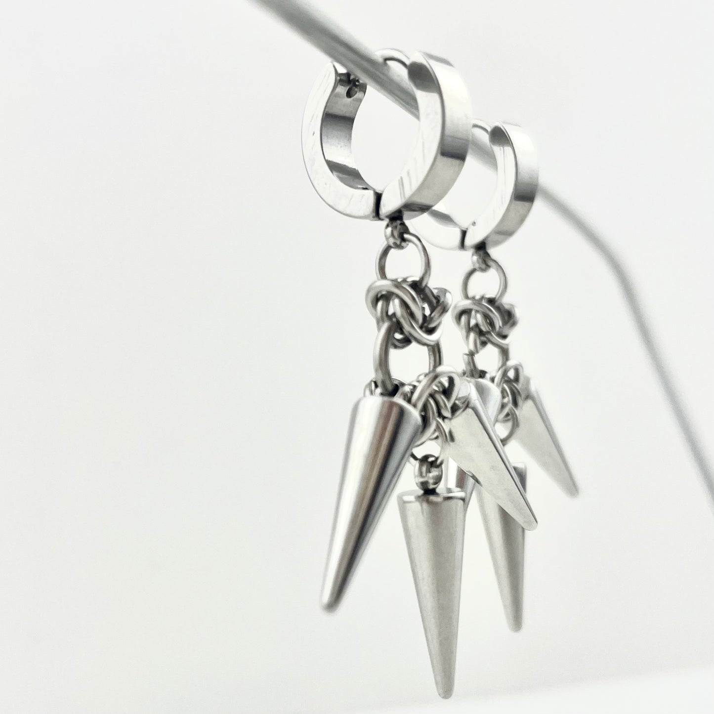 Titanium Waterproof Earrings with Three Rivets and Spiked Pendant