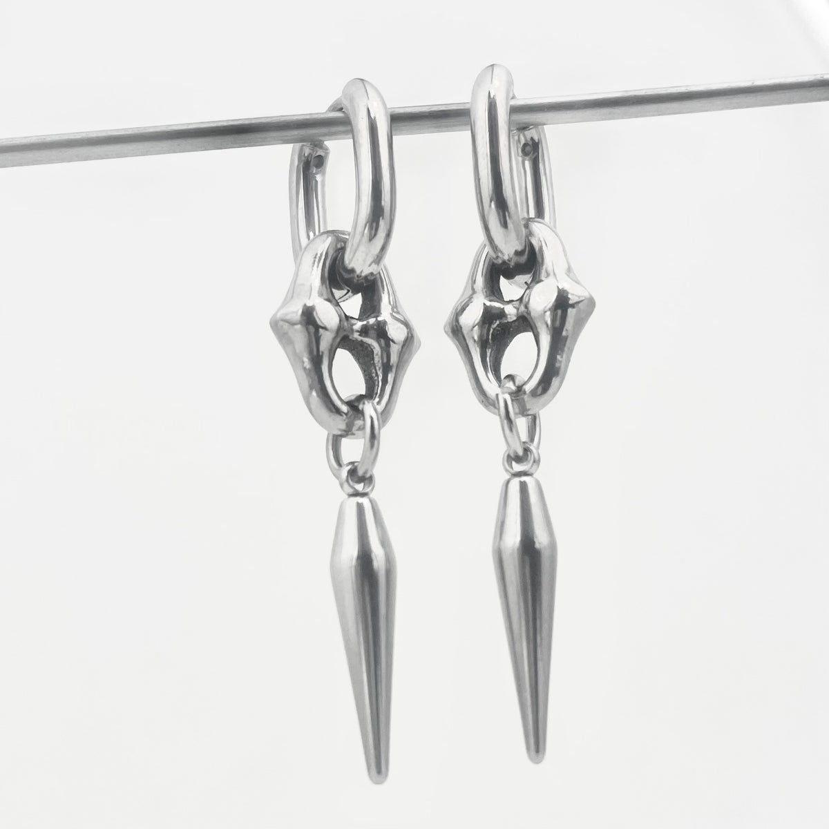 Titanium-Steel Waterproof Pointed Cone Pendant Earrings