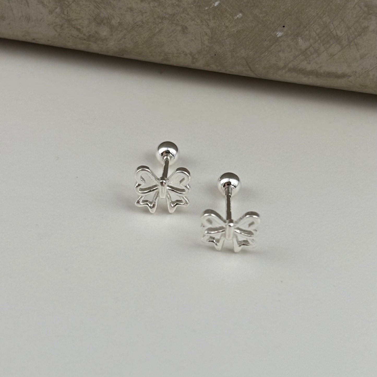 S999 Sterling Silver Bow Earrings