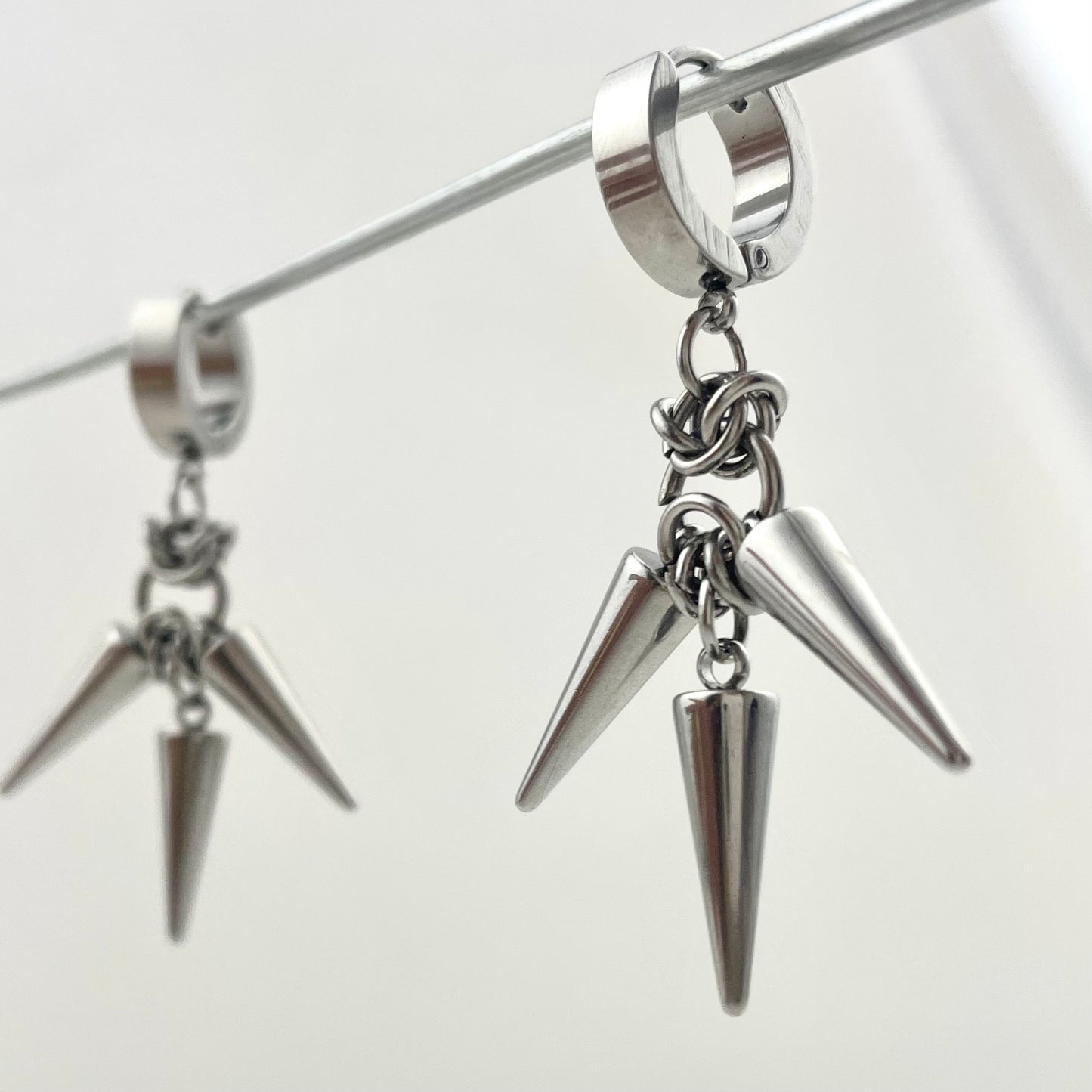 Titanium Waterproof Earrings with Three Rivets and Spiked Pendant