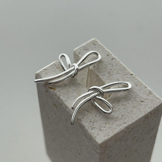 S925 Sterling Silver Through Silver Bow Earrings